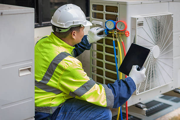 Professional Heat Pump Repair technician working in Madison, IN
